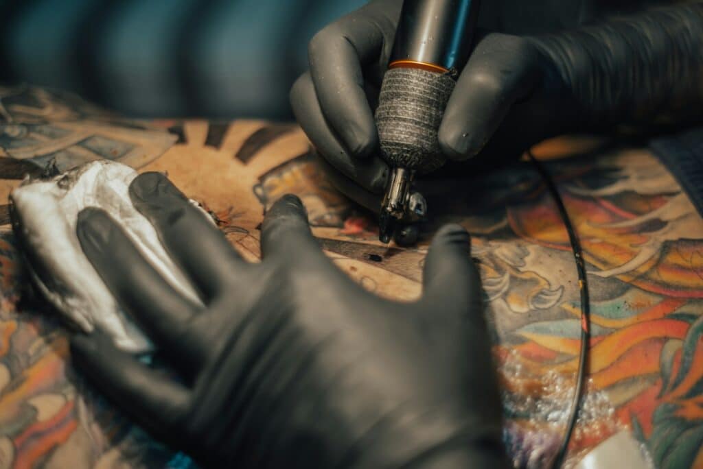 Close up of the tattoo machine. Tattooing.